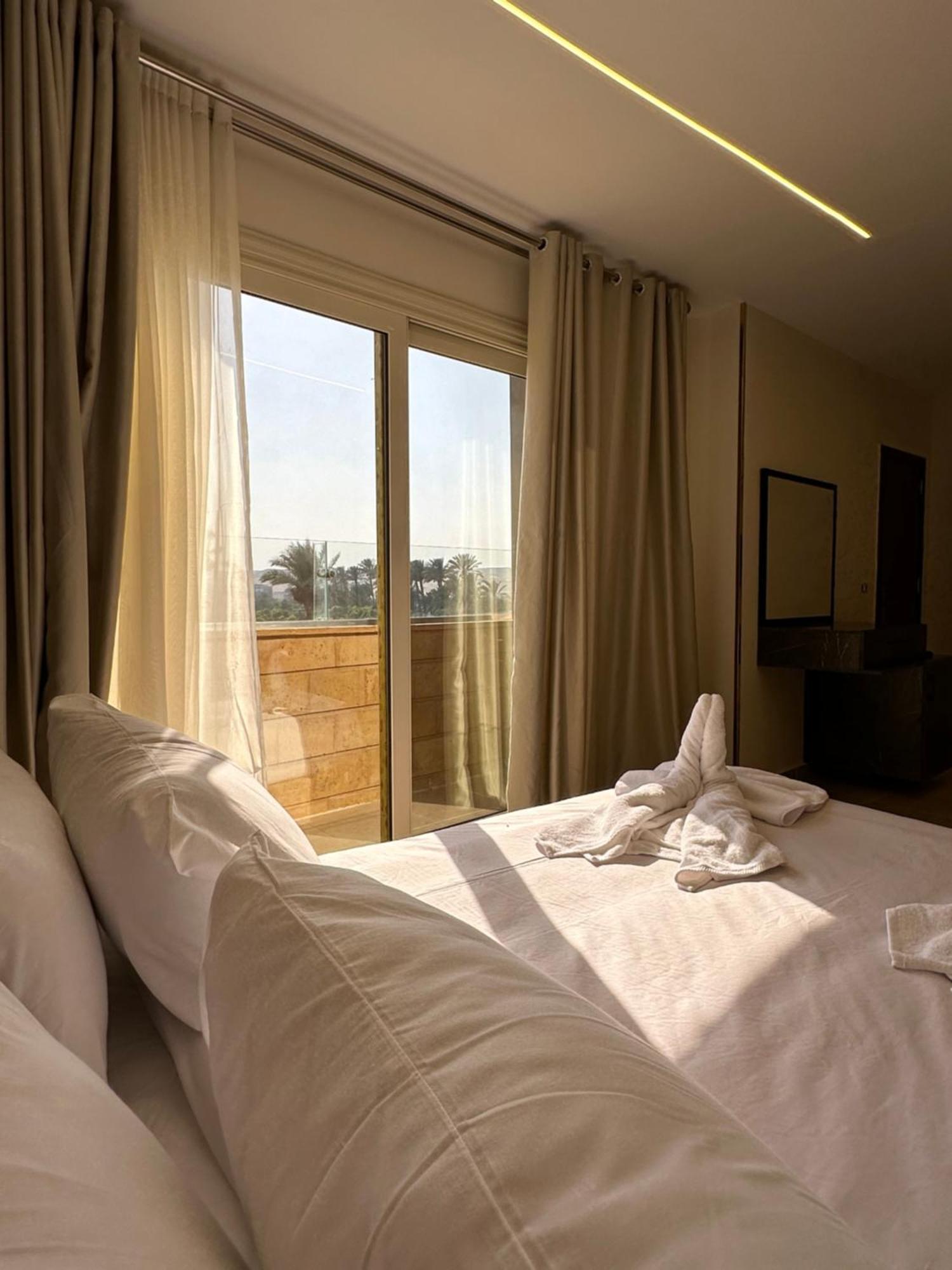 Taj Pyramids View Inn Kafret el-Gabal Exterior foto