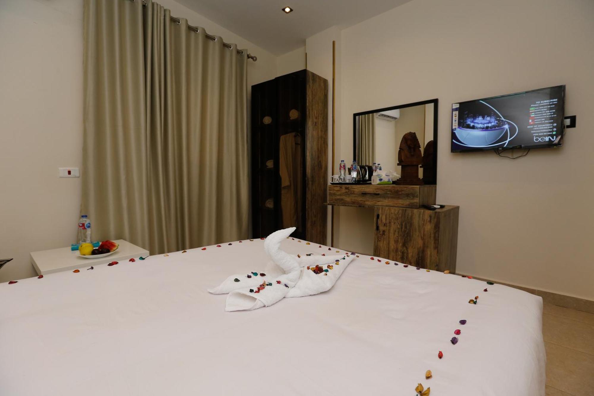 Taj Pyramids View Inn Kafret el-Gabal Exterior foto